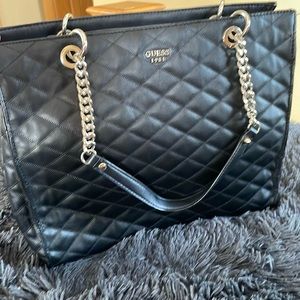 Black with gold hardware Guess handbag